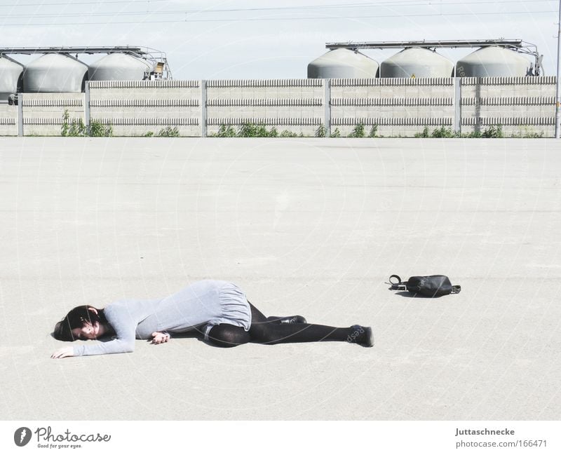 Fallen girl Colour photo Subdued colour Exterior shot Day Full-length Relaxation Closing time Young woman Youth (Young adults) Woman Adults Legs 1 Human being