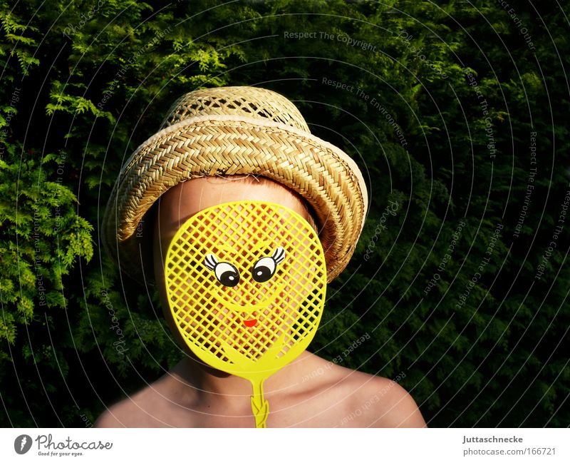 CAMOUFLAGE Colour photo Exterior shot Copy Space right Day Sunlight Portrait photograph Face Child Boy (child) Infancy Head 1 Human being 8 - 13 years Summer
