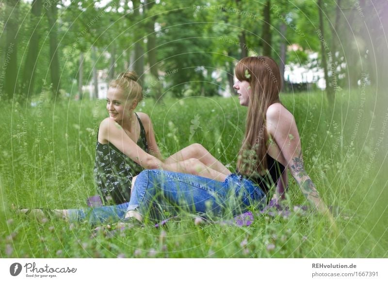 in the park Human being Feminine Young woman Youth (Young adults) Woman Adults 2 18 - 30 years Environment Nature Plant Grass Garden Park Meadow Tattoo Piercing