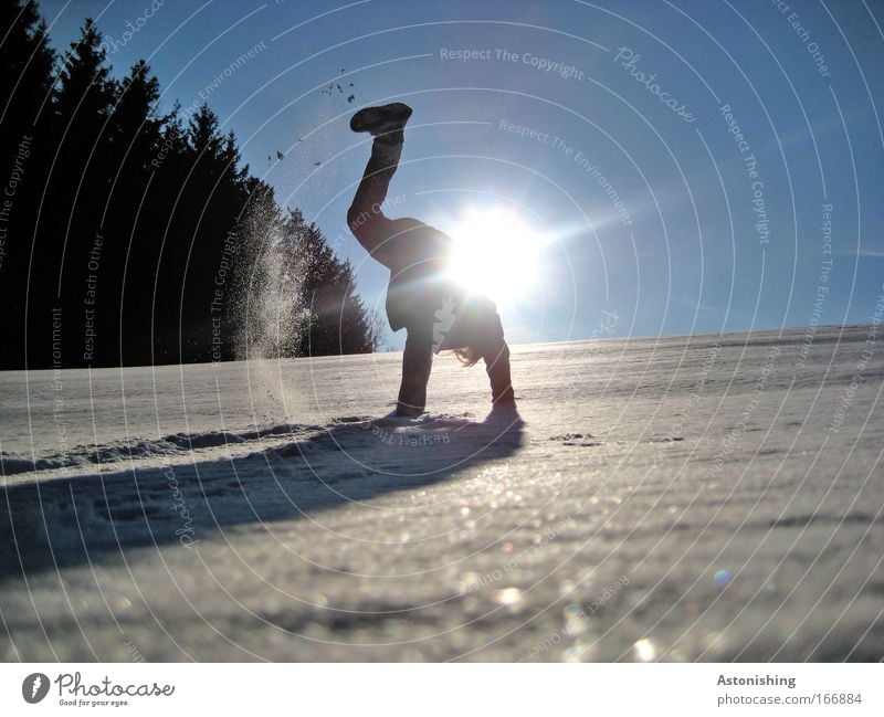 KÜHL-MAN 3 Colour photo Exterior shot Day Light Shadow Contrast Sunlight Full-length Looking away Leisure and hobbies Playing Winter sports Human being