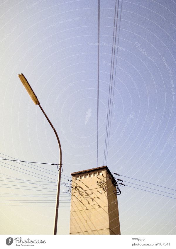 tethered. Exterior shot Deserted Copy Space top Evening Twilight Sunlight Cloudless sky Beautiful weather Tower Manmade structures cottage Electricity pylon