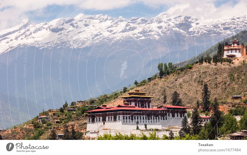 Paro Dzong (Rinpung Dzong) in Bhutan Vacation & Travel Mountain Snowcapped peak Asia Building Tashicho Dzong Parodlong Rinpung Beautiful Brown Green Red White