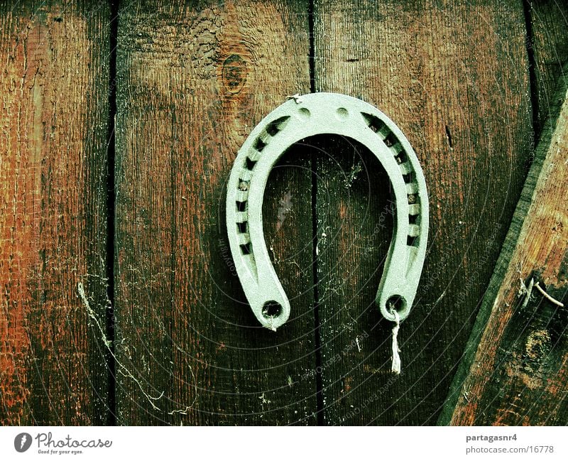 Luck or bad luck? Horseshoe Iron Smith Symbols and metaphors Craft (trade) Good luck charm 1 Wooden wall Wooden board Hang up Close-up Deserted