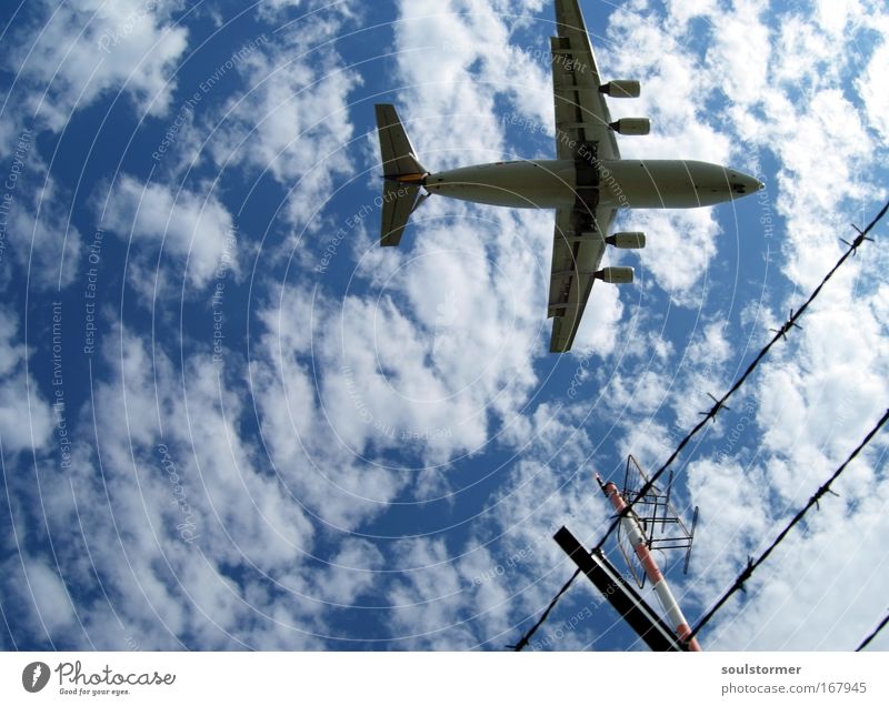 Geometry in flight Colour photo Exterior shot Deserted Copy Space left Day Worm's-eye view Wide angle Aviation Sky Clouds Summer Airport Transport Airplane