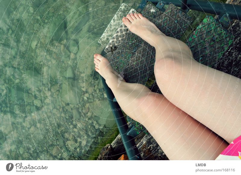 Still too cold Colour photo Exterior shot Copy Space left Day Bird's-eye view Feminine Young woman Youth (Young adults) Legs Feet 1 Human being Summer