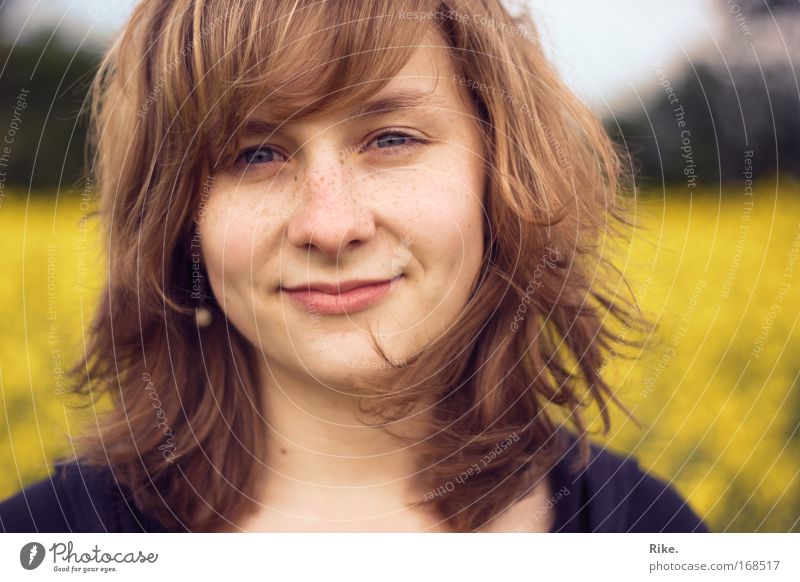 In the spring. Colour photo Exterior shot Day Sunlight Central perspective Portrait photograph Front view Looking into the camera Forward Human being Woman