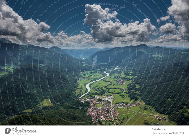 From the air, aerial view over Kobarid Leisure and hobbies paraglide Summer Mountain Landscape Sky Clouds Beautiful weather Field River soca cobarid Slovenia
