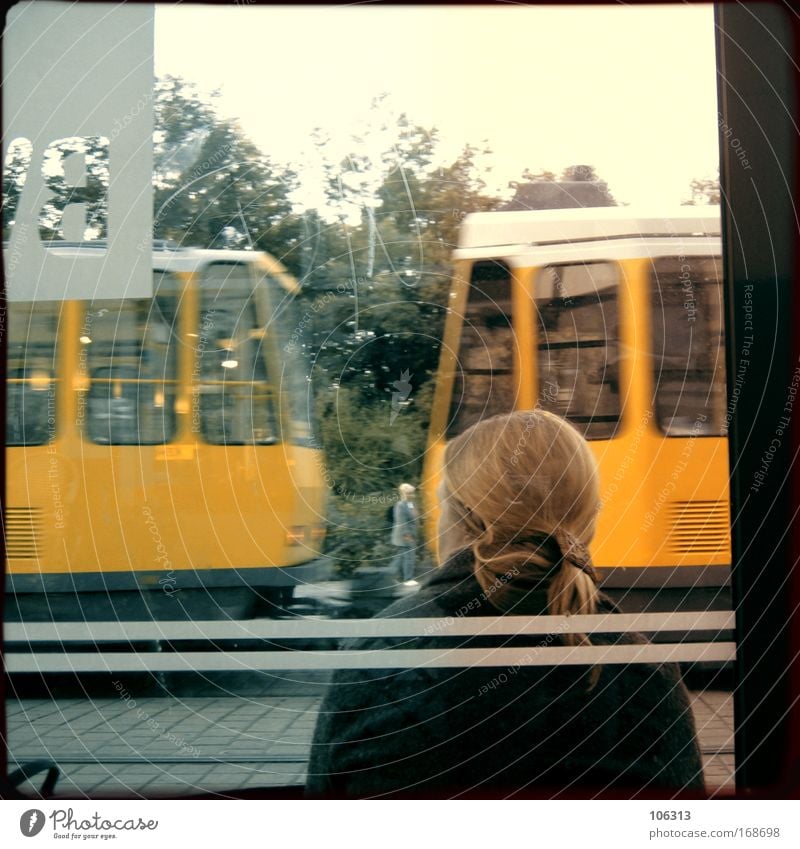 Photo number 124452 Colour photo Woman Adults Village Town Tram Wait Track Glass Dynamics Movement