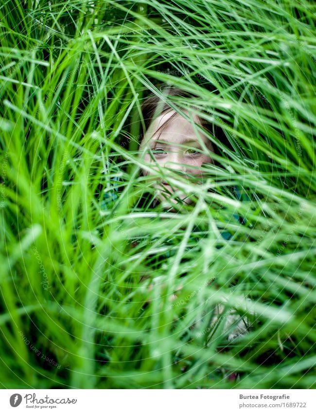 Girl in the Grass Garden Human being Feminine Child Head 1 Foliage plant Long-haired Smiling 2016 D700 Lina nikonic Burtea Photography 50mm Blur Colour photo