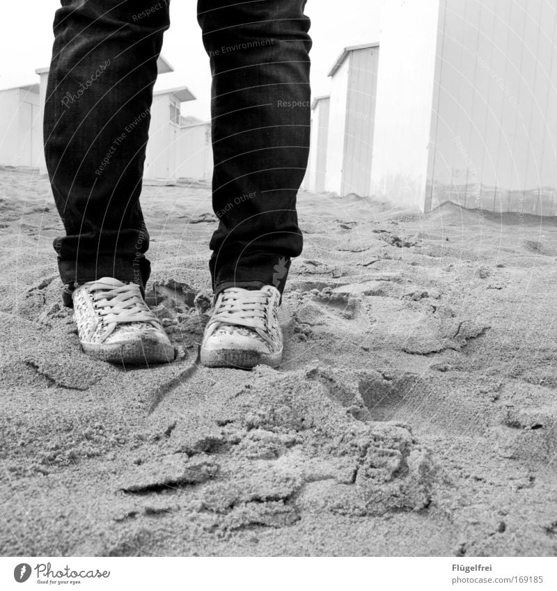 pass Vacation & Travel Beach Ocean Legs Feet 1 Human being Sand Wall (barrier) Wall (building) Jeans Footwear Stand Think Chucks east Beach hut Insecure Empty