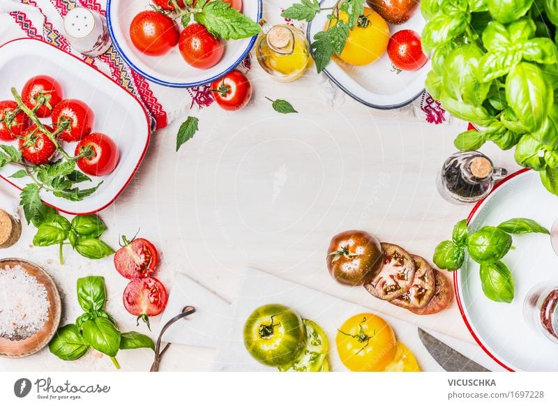 Variety of colorful tomatoes with salad ingredients Food Vegetable Lettuce Salad Herbs and spices Cooking oil Nutrition Lunch Dinner Organic produce