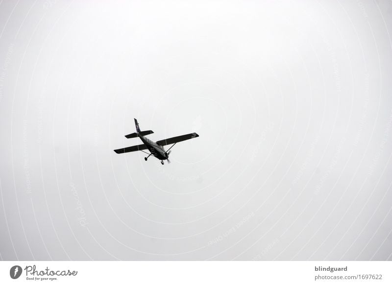 I've got to go Airplane propeller engine Light aircraft Supply plane air traffic Gray colourless Gloomy Flying Sky Black & white photo Aviation