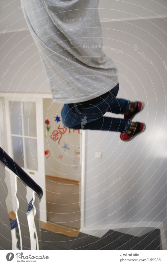 jumping off Colour photo Interior shot Light Central perspective Long shot Human being Masculine Boy (child) Man Adults Youth (Young adults) Life Back Bottom