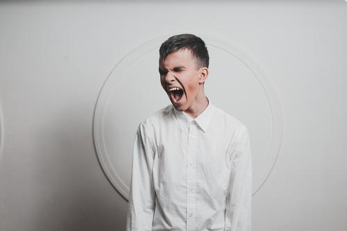 Screaming boy Young man Youth (Young adults) 1 Human being Shirt Black-haired Aggression Broken Crazy Wild Anger White Emotions Might Disappointment Loneliness