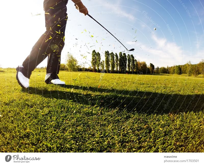 Golfer performs a golf shot from the fairway Lifestyle Relaxation Leisure and hobbies Playing Vacation & Travel Tourism Summer Club Disco Sports Human being Man