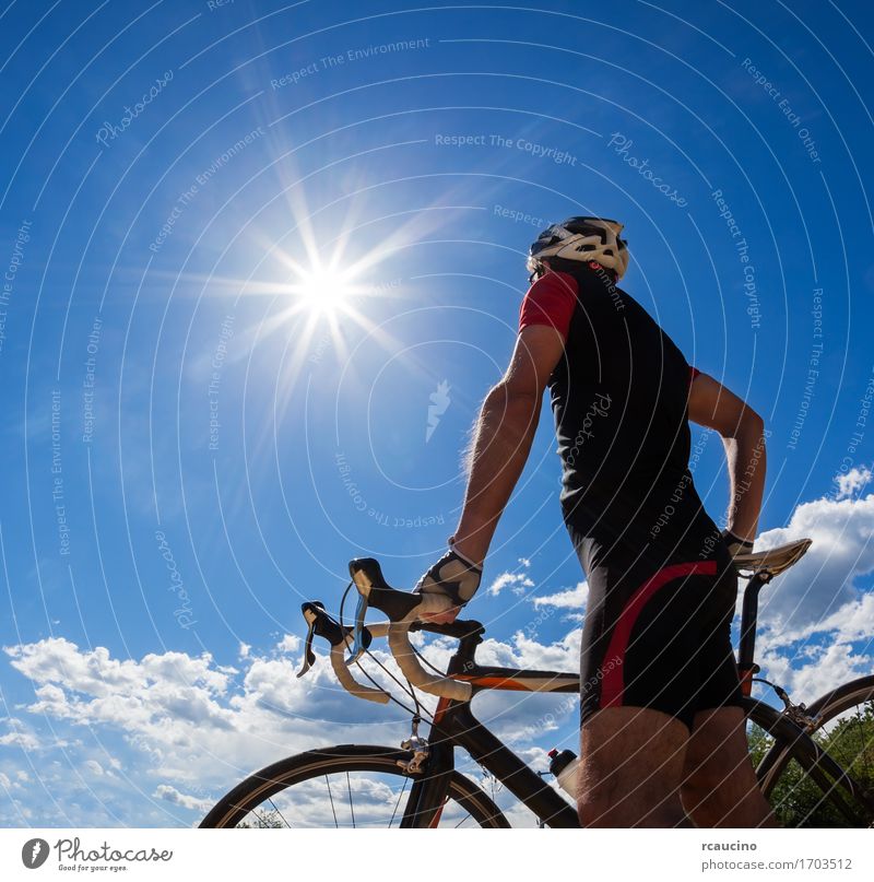 Road cyclist resting on his bike Lifestyle Joy Relaxation Leisure and hobbies Vacation & Travel Adventure Freedom Summer Sun Sports Cycling Human being Man