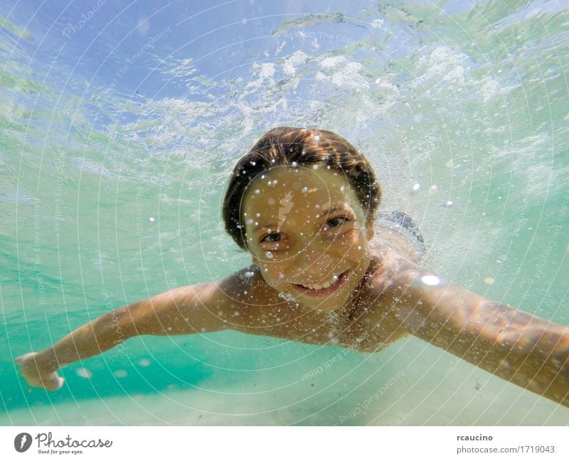 Young boy swimming underwater in tropical sea Joy Happy Leisure and hobbies Summer Ocean Sports Dive Child Human being Baby Boy (child) Man Adults Small Cute