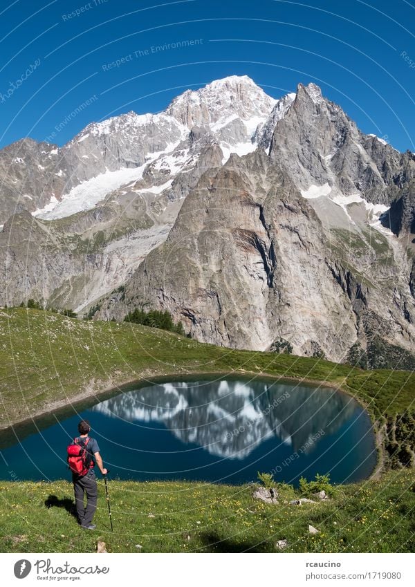A hiker infront of Mont Blanc. Courmayer, Italy Leisure and hobbies Vacation & Travel Trip Summer Mountain Hiking Sports Human being Boy (child) Man Adults