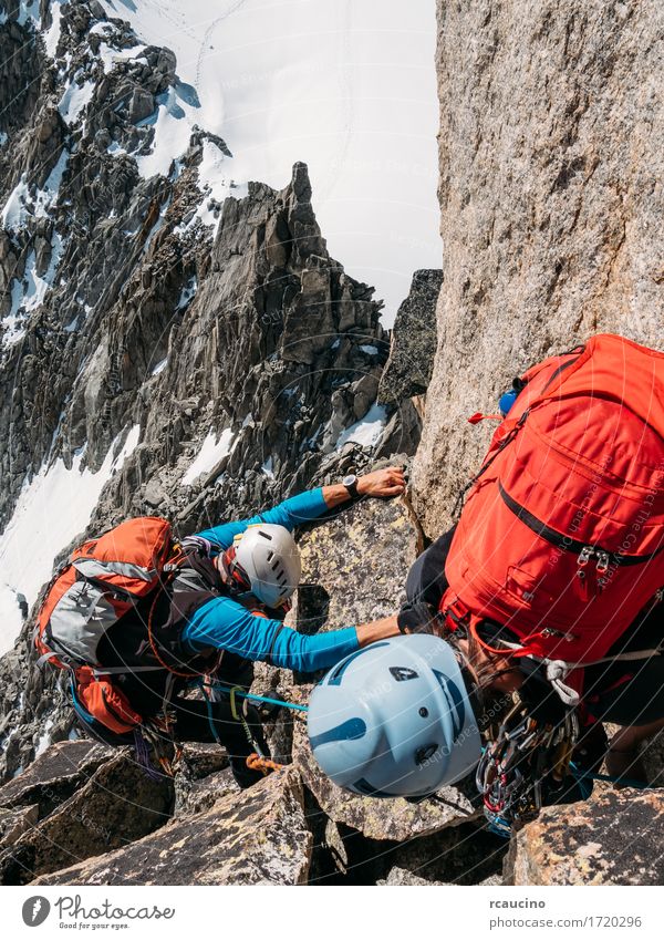 Climber helps another climber to reach the top of a mountain Lifestyle Beautiful Vacation & Travel Adventure Expedition Winter Snow Mountain Hiking Sports