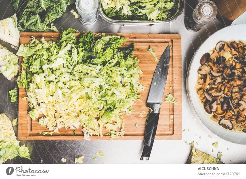 Chopped savoy cabbage with kitchen knife Food Vegetable Herbs and spices Nutrition Lunch Dinner Buffet Brunch Organic produce Vegetarian diet Diet Crockery