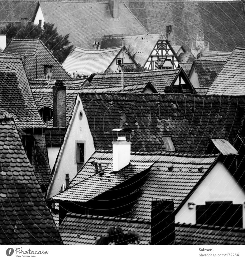 Lauda Däscha Black & white photo Exterior shot Detail Structures and shapes Town Old town House (Residential Structure) Building Roof Gloomy Rain Wet