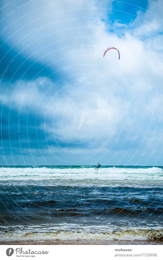 kitesurfing Human being Young man Youth (Young adults) 1 18 - 30 years Adults Water Clouds Summer Wind Waves Coast Moliets-et-Maa France Wetsuit Helmet Sports