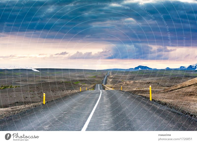 Ondulated and empty road in the sub-artic icelandic landscape Vacation & Travel Tourism Summer Mountain Nature Landscape Sky Autumn Street Line Dark Blue Gray