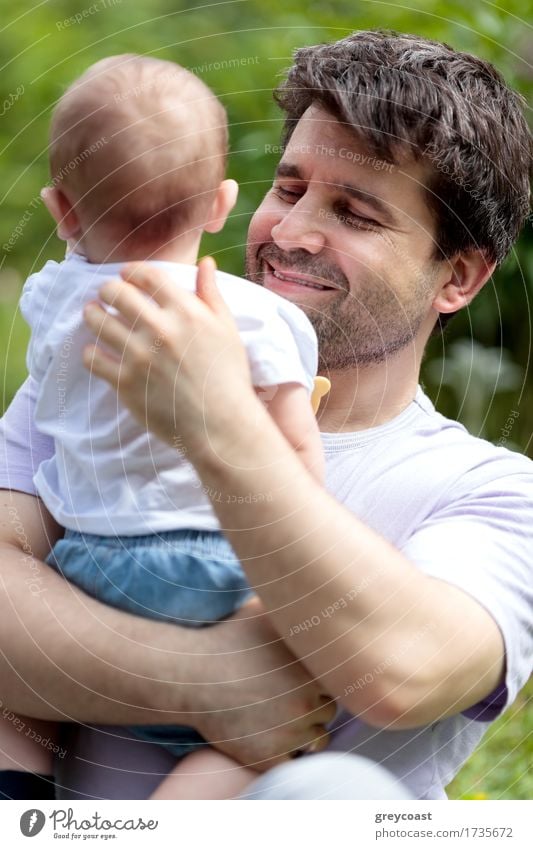 Loving father carrying his young child outdoors Joy Happy Summer Child Baby Boy (child) Father Adults Family & Relations Infancy 2 Human being 0 - 12 months