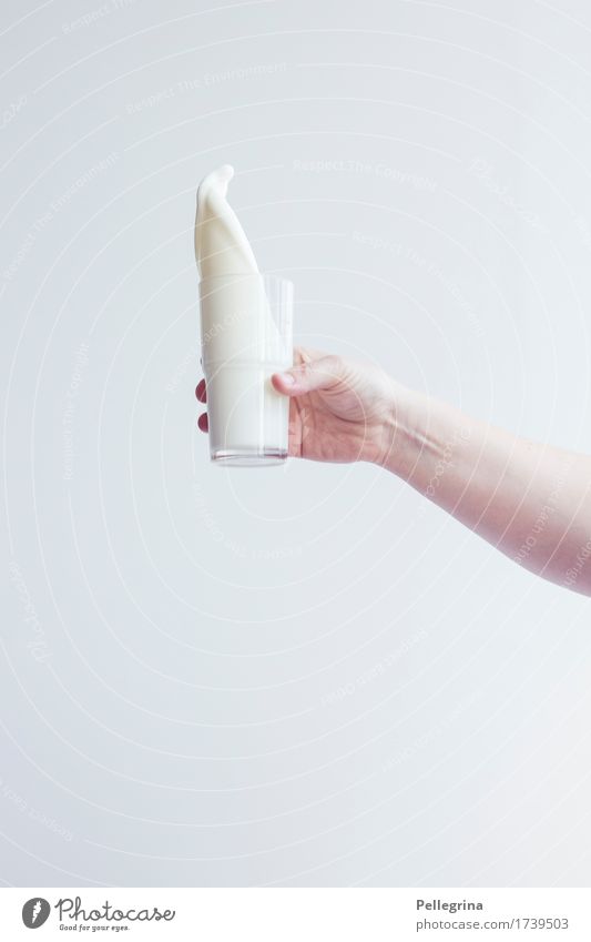 A glass of milk Milk Hand Spill Movement Glass