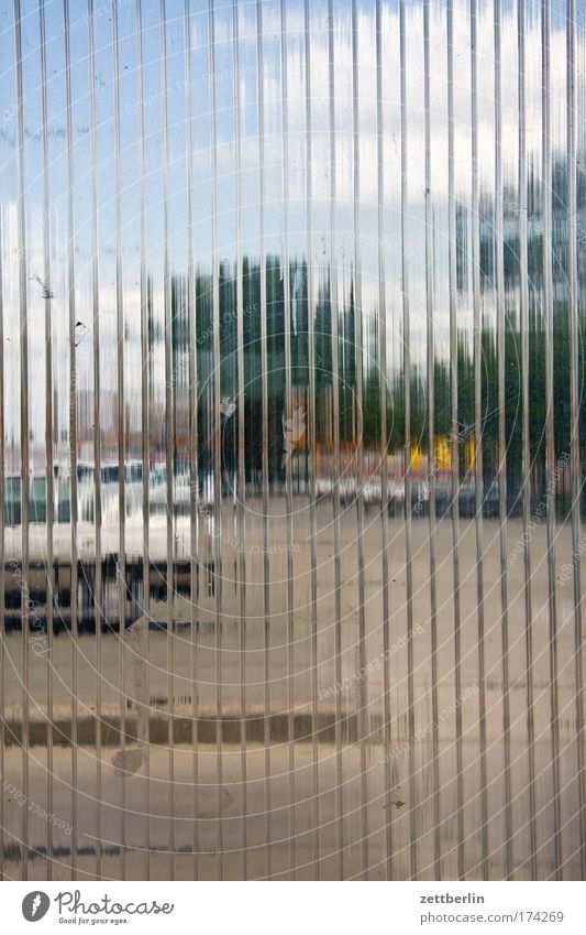 review Glass Ribbed glass Transparent transparency Places Parking lot Parking area porch Window Car Tree Sky Clouds abstraction Unclear Copy Space