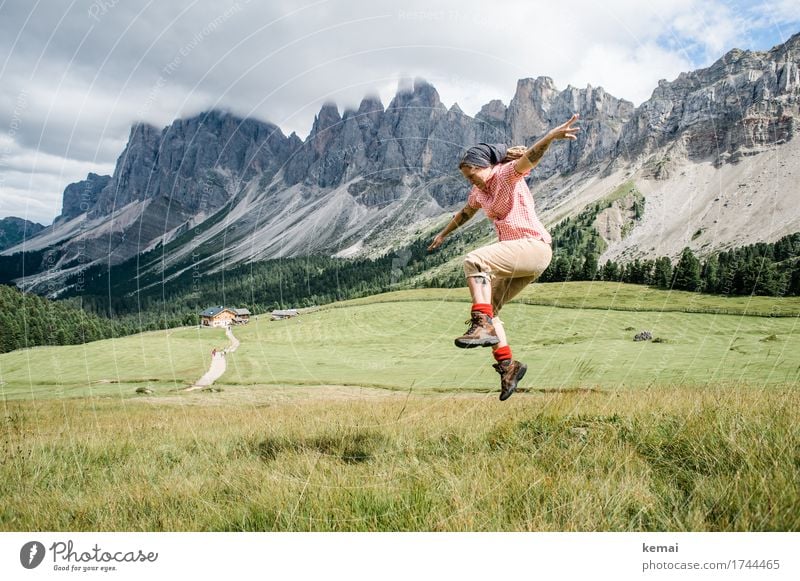 Woman jumps in the mountains Life Harmonious Well-being Contentment Leisure and hobbies Playing Vacation & Travel Trip Adventure Freedom Mountain Hiking