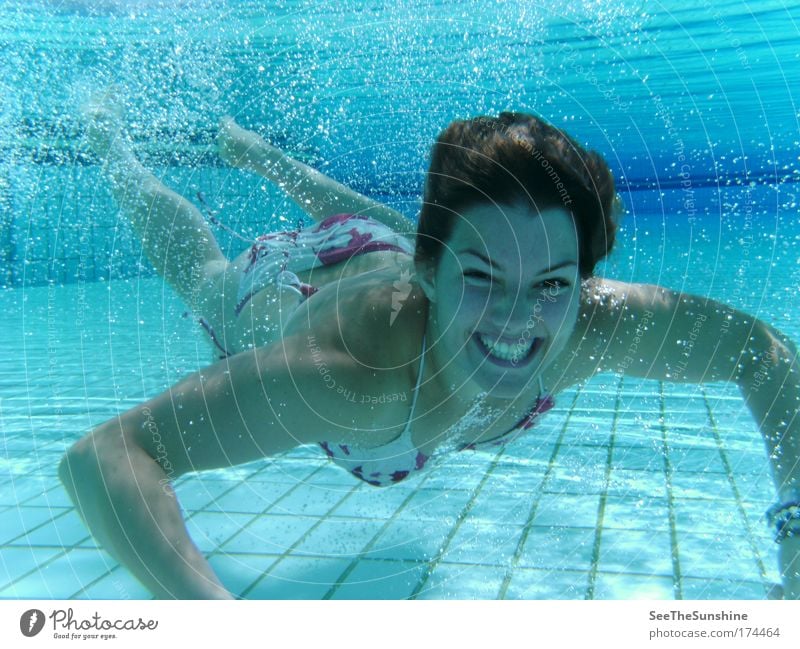A moment of happiness. Colour photo Underwater photo Sunlight Looking into the camera Joy Harmonious Well-being Contentment Feminine Young woman