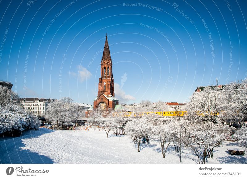 Winter atmosphere in Görlitzer Park with view of church and elevated railroad II Pattern Abstract Urbanization Capital city Copy Space right Copy Space left