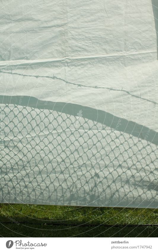 Shadows on the tarpaulin Covers (Construction) Sun Summer Fence Wire netting fence Barbed wire Barbed wire fence Border Neighbor Tent Cloth Party Party space