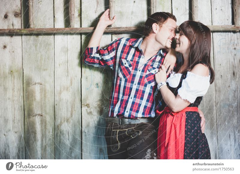 Young couple in traditional costume Lifestyle Style Vacation & Travel Tourism Oktoberfest Fairs & Carnivals Dance Human being Masculine Feminine Young woman