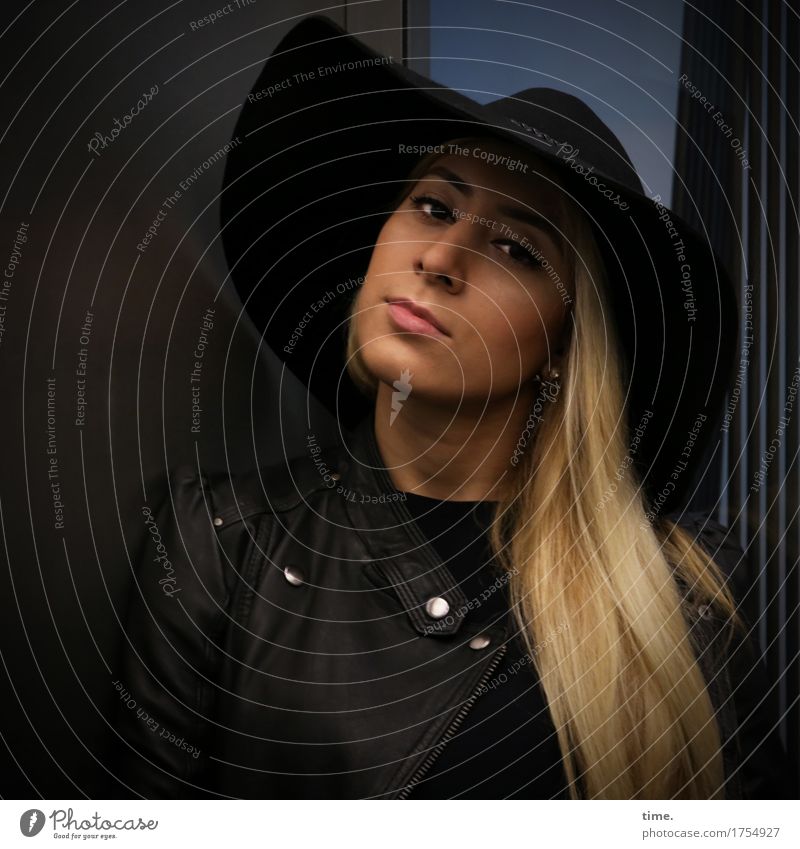 blonde woman with hat Feminine 1 Human being Elevator Jacket Leather jacket Hat Blonde Long-haired Observe Think Looking Wait pretty Self-confident Cool (slang)
