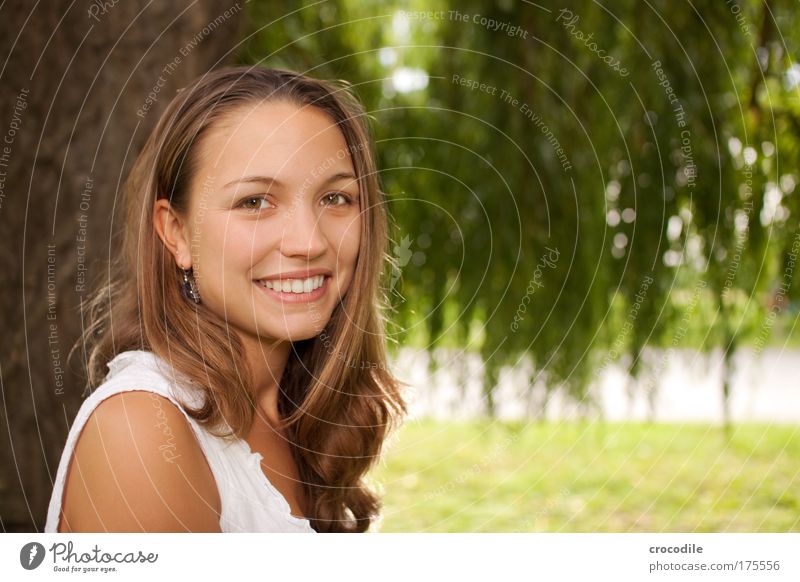 Beauty II Colour photo Exterior shot Copy Space right Day Flash photo Shallow depth of field Central perspective Portrait photograph Upper body Looking