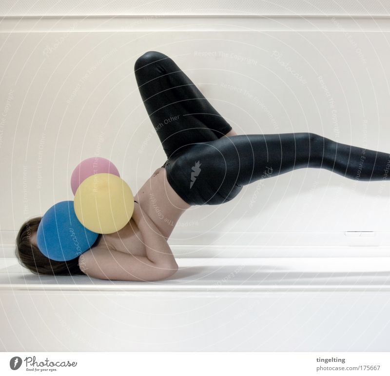 cmyk Colour photo Subdued colour Interior shot Copy Space bottom Feminine Young woman Youth (Young adults) Body Arm Legs 1 Human being Leggings Balloon Lie Blue