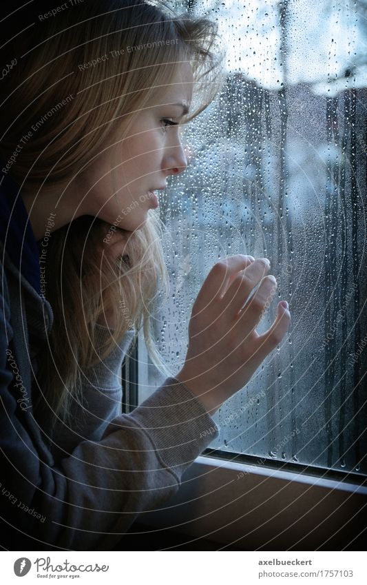 woman looking through window with raindrops Human being Feminine Young woman Youth (Young adults) Woman Adults 1 18 - 30 years Autumn Winter Weather Bad weather