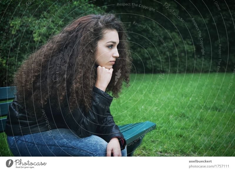 sad young woman sitting on bench Lifestyle Human being Feminine Girl Young woman Youth (Young adults) Woman Adults 1 13 - 18 years Park Brunette Long-haired