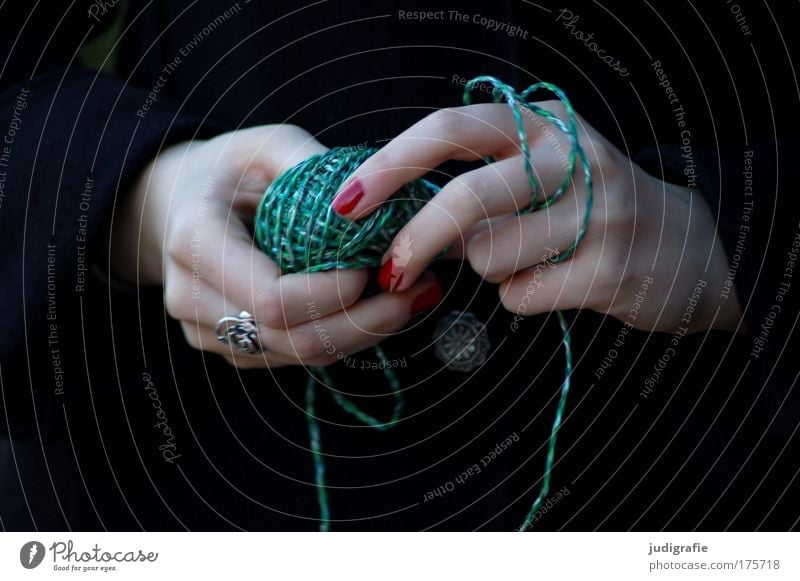 green Colour photo Detail Handcrafts Knit Feminine Young woman Youth (Young adults) Playing Green Red Knot Wool Sewing thread Coil Magic String