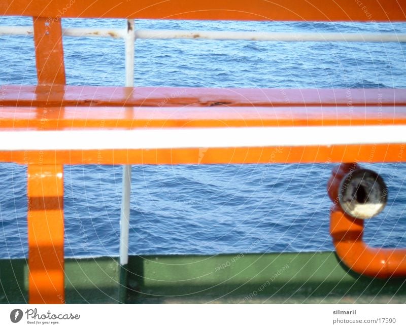 Sit down, sit down. Orange-red Green Places Waves Vacation & Travel Ferry Watercraft Photographic technology Bench Seating Blue