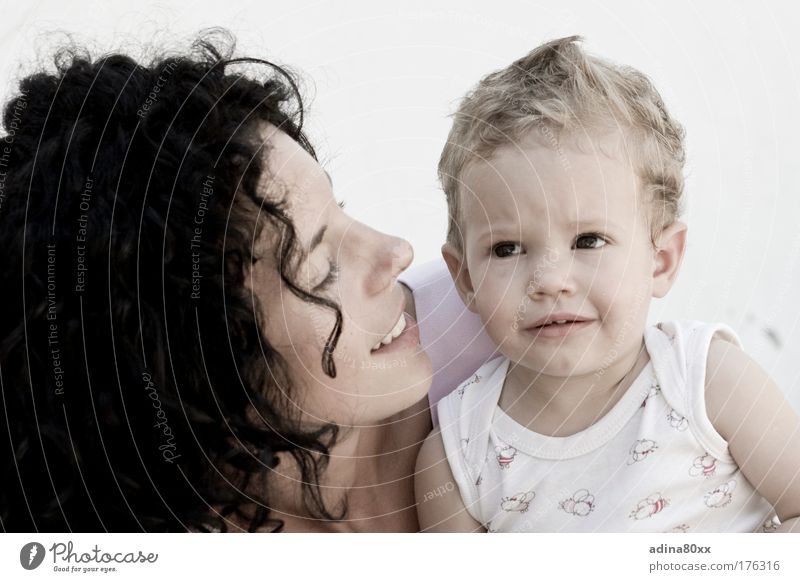 motherly love Colour photo Interior shot Copy Space left Copy Space right Copy Space top Copy Space bottom Neutral Background Day portrait Downward Looking away