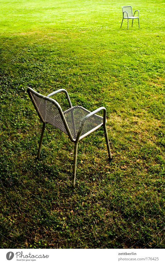 Two more chairs Green Lawn Grass surface Meadow Park Chair Garden chair Outdoor furniture Meeting Date Comparison Communicate Dialog partner Opposite Places
