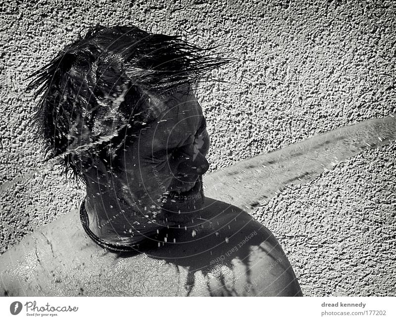 cold clear water Black & white photo Exterior shot Copy Space right Day Shadow Contrast Central perspective Front view Half-profile Looking away Closed eyes