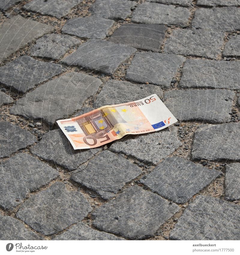 The money's on the street. Street Money Lose Euro 50 Loose change Bank note Cobblestones Sidewalk Doomed Find Lie Colour photo Exterior shot Deserted