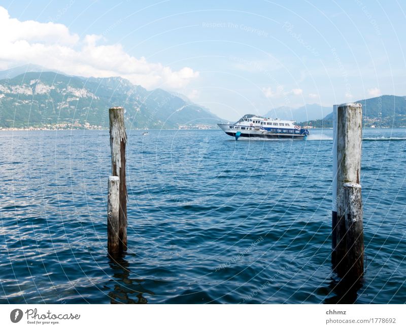 Speedboat on Lake Como Boating trip Navigation Water Wing log investor Mountain Alps bank Clouds