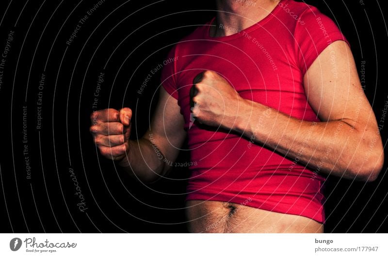 ducenta defixa Colour photo Studio shot Copy Space left Artificial light Upper body Man Adults Chest Arm Fingers Stomach T-shirt Aggression Muscular Pink Red