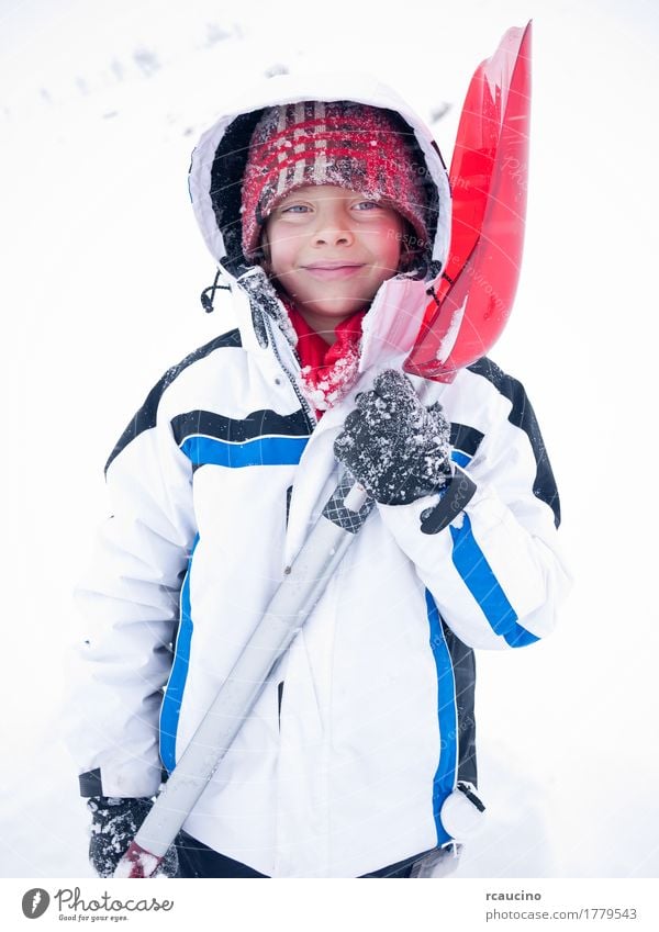 Child portrait winter snow Lifestyle Joy Relaxation Winter Snow Mountain Boy (child) Man Adults Clothing Smiling Blue Red White Beret Caucasian cold ice