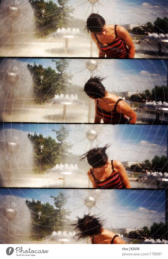 Shed your hair... Colour photo Exterior shot Lomography Copy Space left Day Light Contrast Sunlight Motion blur Human being Feminine Young woman